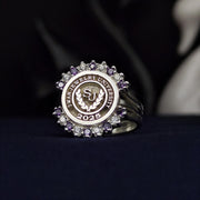 Women’s university ring featuring a stunning combination of purple and white stones, crafted for elegance and academic pride. This custom signet ring is perfect for celebrating milestones and achievements in style.